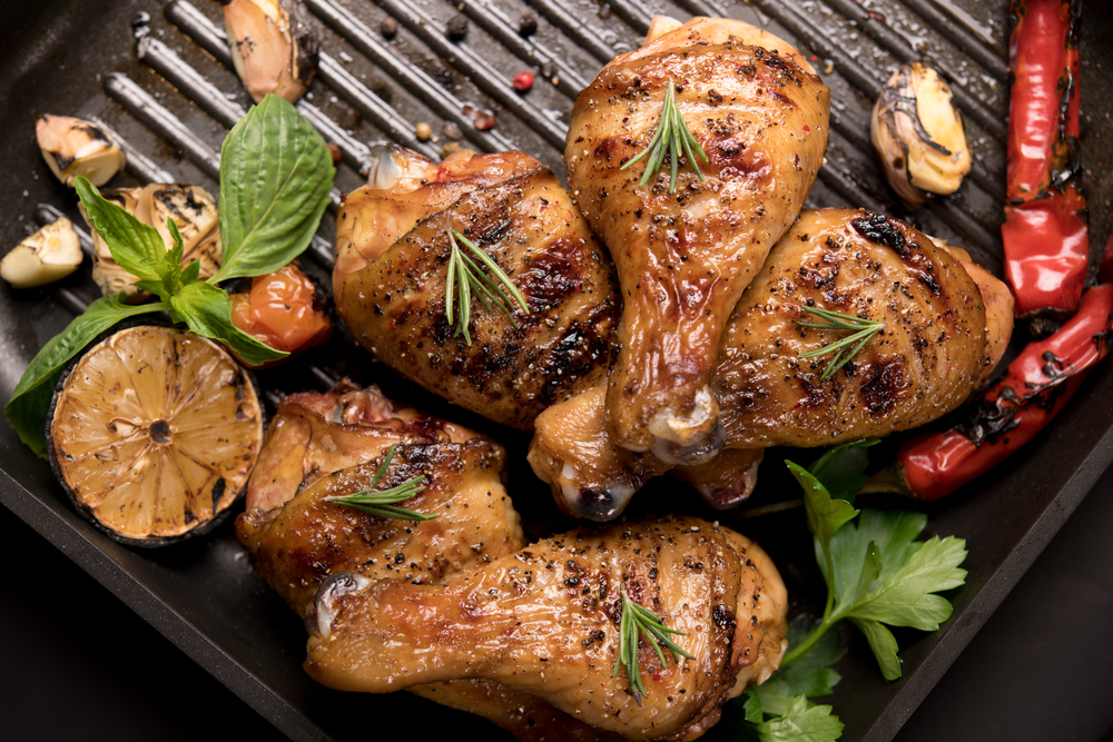 grilled,chicken,leg,with,various,vegetables,on,pan